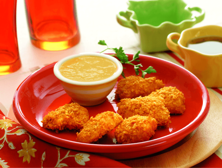 Nuggets de pollo con salsa de mostaza y miel
